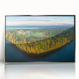 Large art print of a European Lithuanian scenery in muted greens and blues on a framed acrylic.