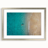 Extra large abstract art print of the Mediterranean Sea in muted blue and white tones, framed in silver.