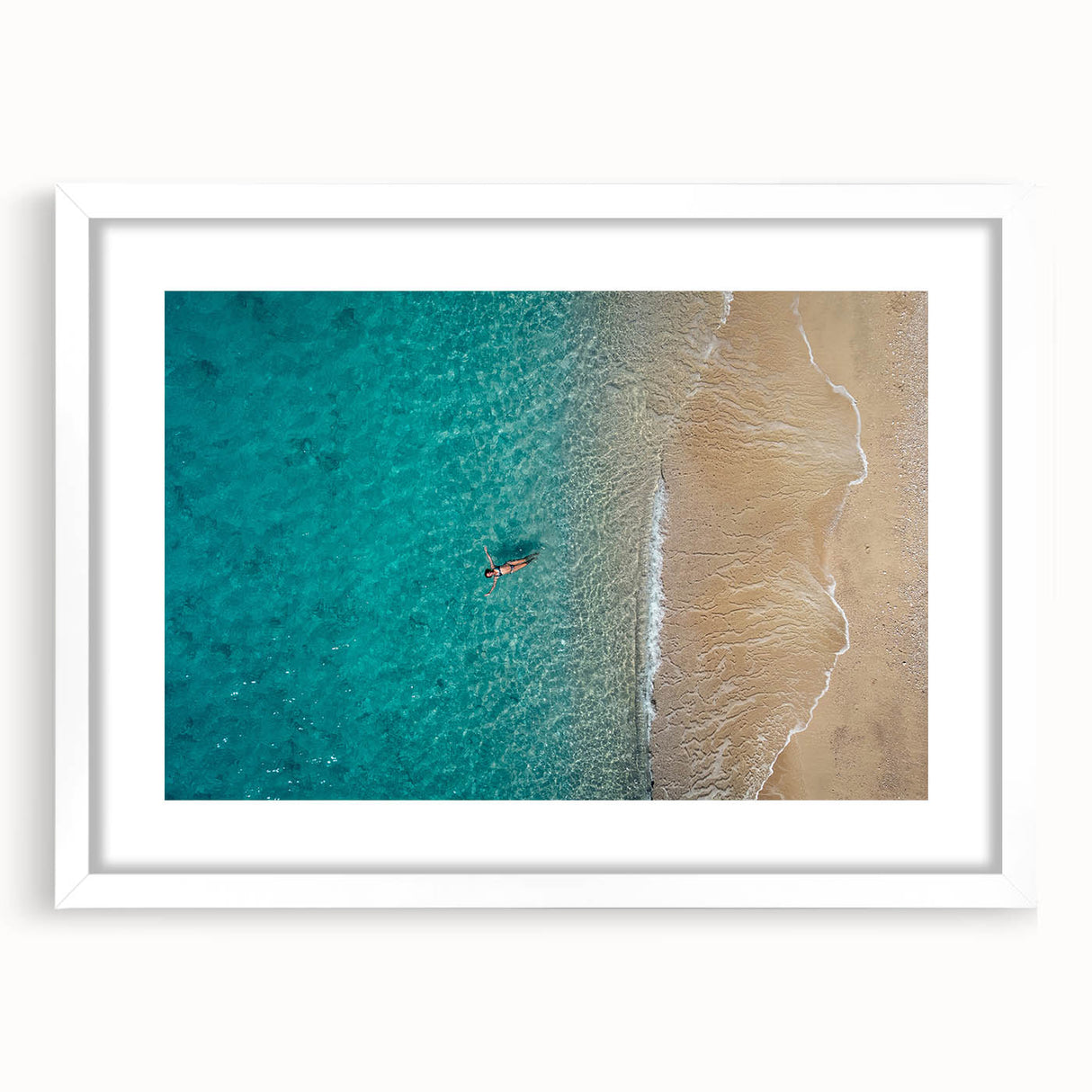 Textured art print of the Mediterranean Sea in muted blue and white tones, framed with a white mat.