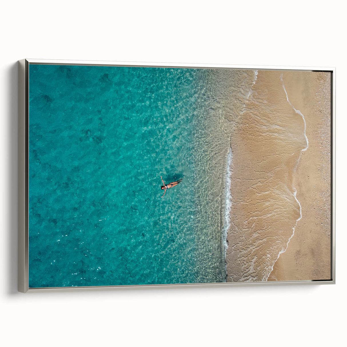 Framed canvas landscape art painting depicting the Mediterranean Sea, with vibrant blue waters and a silver frame.