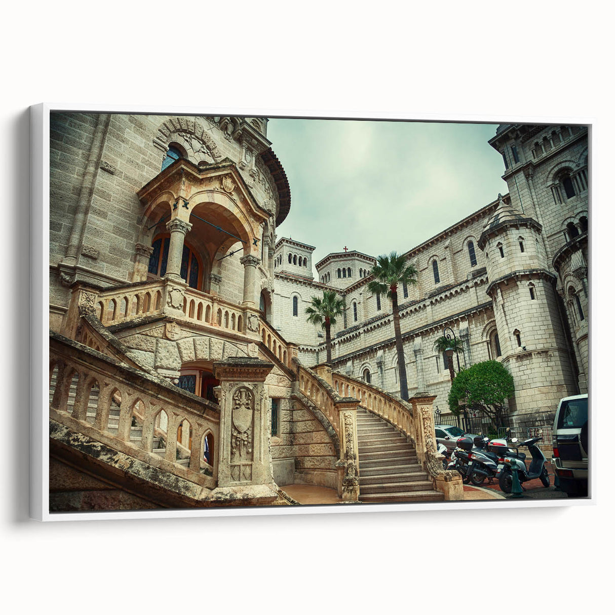 Vintage poster art of Monaco featuring colorful buildings on canvas, framed in white, suitable for living room decor.