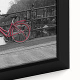 Extra large black wall art of Amsterdam scenery on framed canvas, featuring colorful, textured brush strokes.
