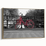 Framed canvas wall art depicting a vintage-style Amsterdam landscape in muted gold and black tones, ideal for bedroom decor.