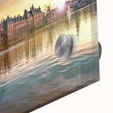 Large abstract wall art depicting a European scenery in muted earth tones on acrylic glass.