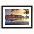 Abstract art print of a colorful European scenery in vibrant hues on a textured, extra large canvas, framed in black.