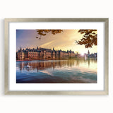Extra large abstract art print of a European scenery in muted earth tones, framed with a silver mat.