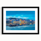 Abstract art print of Lisbon scenery in vibrant colors on a large framed canvas, ideal for living room decor.