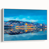 Vintage poster art of Lisbon featuring vibrant colors on a large framed canvas, ideal for living room decor.