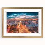 Abstract art print of a European landscape in muted earth tones on a gold-framed canvas, suitable for dining room decor.