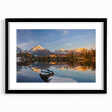 Extra large abstract art print featuring a colorful European scenery, textured appearance on a black framed mat.