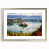 Abstract art print of a European landscape in muted green and blue tones on a framed silver mat, ideal for dining room decor.