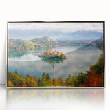 Acrylic print of a serene Slovenian landscape in muted green and blue tones, framed in silver.