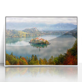 Large art print of a Slovenian landscape in muted green and blue tones on a framed acrylic.