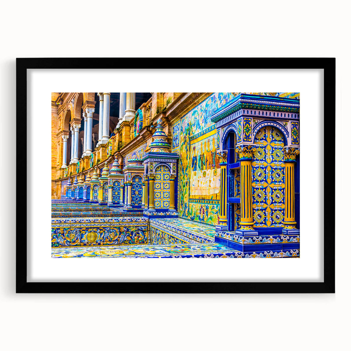 Abstract art print depicting colorful, textured scenery of Andalucia, Spain, presented in a large black-framed mat.