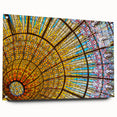 Acrylic print of a large abstract depiction of Barcelona in muted orange and blue tones.