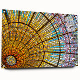Acrylic print of a large abstract depiction of Barcelona in muted orange and blue tones.