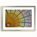 Extra large abstract art print of Barcelona scenery in silver frame, featuring textured brush strokes in muted earth tones.