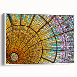 Vintage poster art of Barcelona with colorful details on a large white-framed canvas, ideal for living room decor.