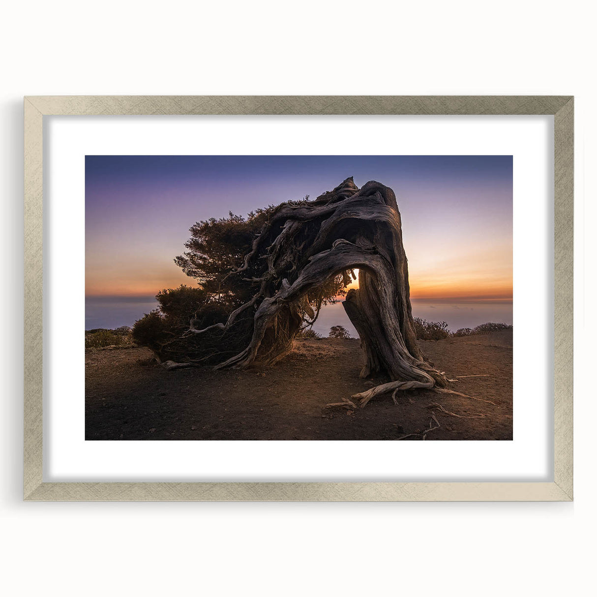 Extra large abstract art print of a European scenery in pastel shades on a textured canvas, framed in silver.