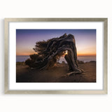 Extra large abstract art print of a European scenery in pastel shades on a textured canvas, framed in silver.