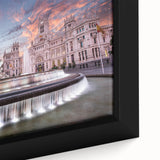 Close-up of a black wall art canvas depicting a textured, colorful Madrid cityscape, ideal for living room decor.