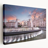 Large stretched canvas depicting a vibrant street scene in Madrid with vivid red and yellow tones.