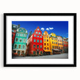 Abstract art print of Stockholm scenery in vibrant colors on a textured, extra large canvas, framed in black.
