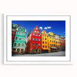 Abstract art print of Stockholm skyline in muted blue and gray tones on a framed white mat.