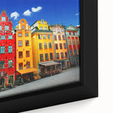 Extra large framed canvas of Stockholm scenery in black with colorful, textured details, ideal for living room decor.