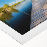 Art deco poster of a serene Swedish landscape in muted green and blue tones on rolled canvas, ideal for dining room decor.