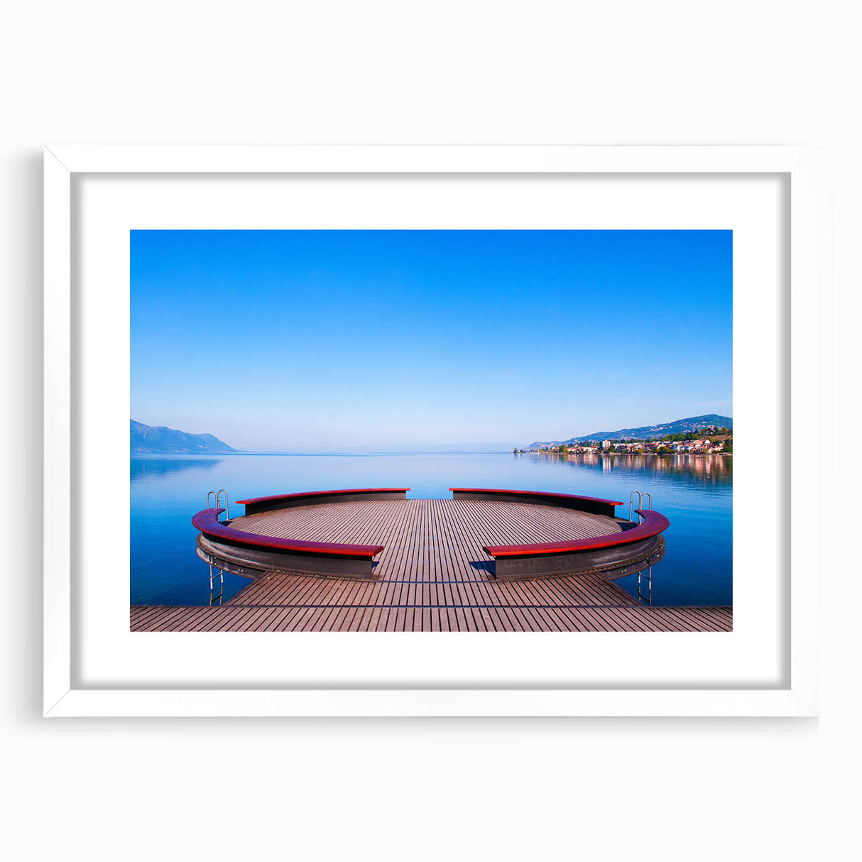 Abstract art print of Geneva scenery in muted blue and green tones, framed with a white mat, ideal for dining room decor.
