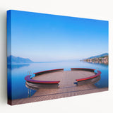 Large art depicting the Geneva skyline in muted blue tones on stretched canvas, suitable for kitchen wall art.