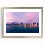 Textured abstract art print of Acapulco scenery in muted earth tones, framed in silver, ideal for bedroom decor.