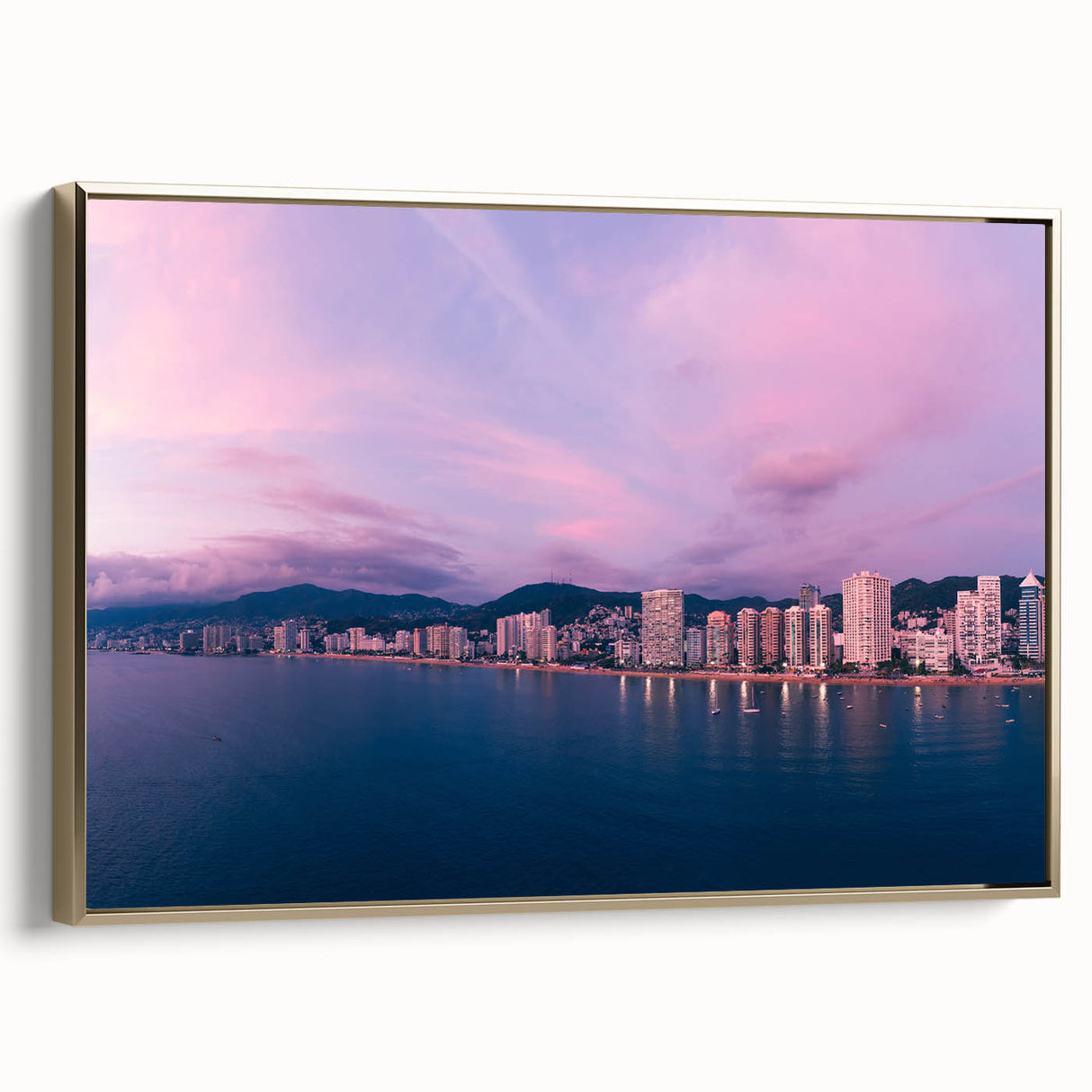 Framed canvas of vintage Acapulco landscape with black and gold tones, ideal for bedroom wall art.