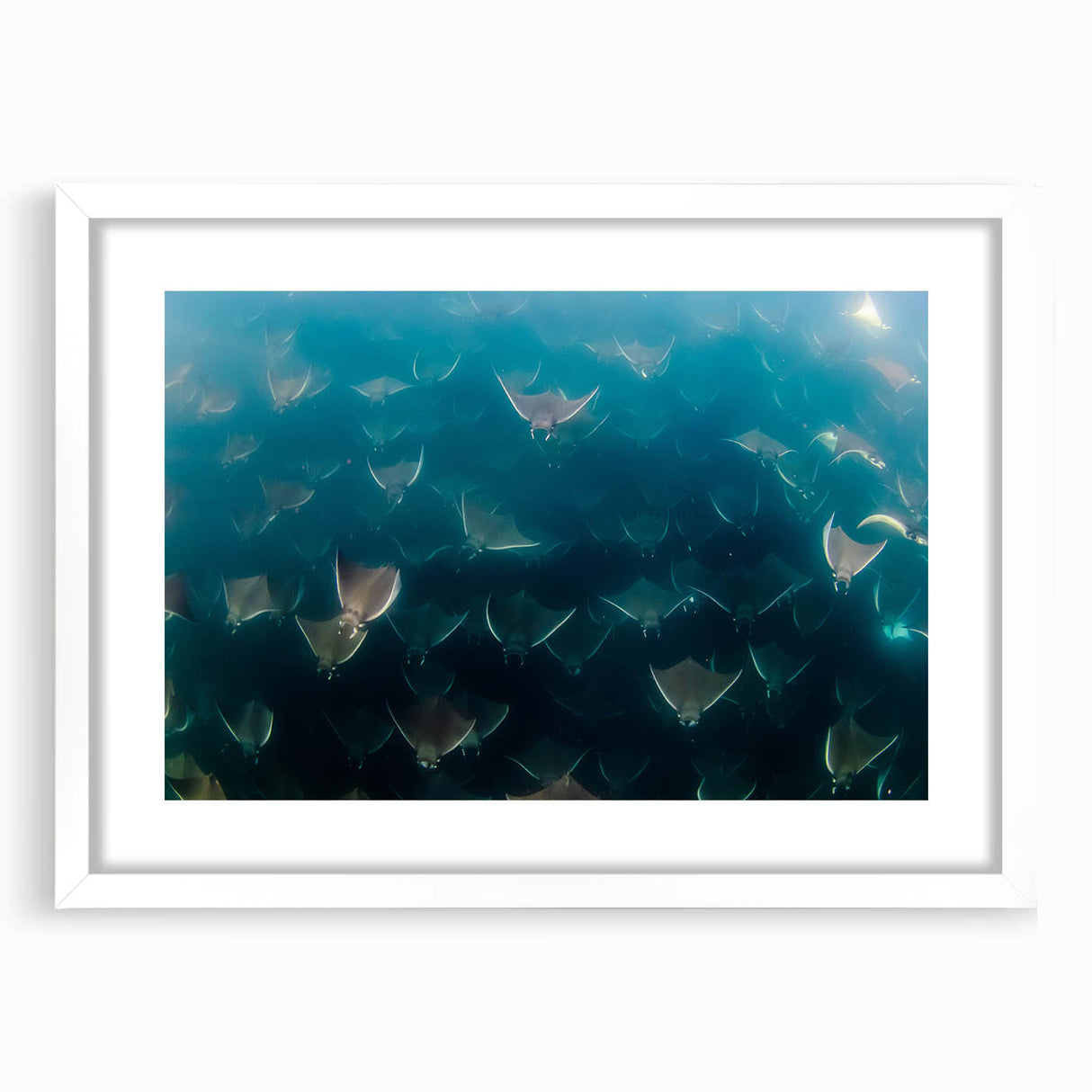 Abstract art print of Baja California scenery in muted earth tones on a white framed canvas, suitable for dining room decor.