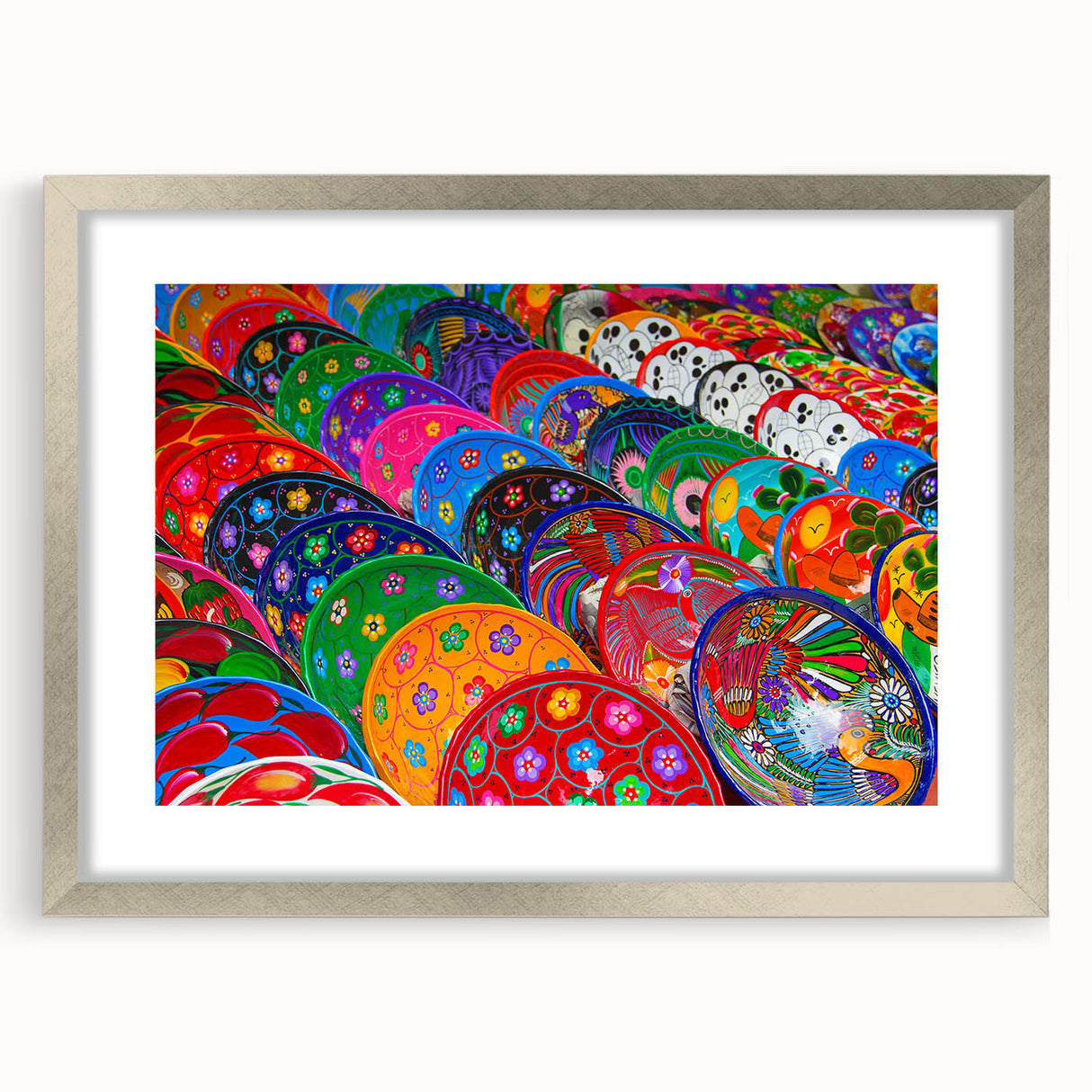 Textured abstract art print of Cancun scenery in silver frame, with muted blue and green tones, ideal for bedroom art.