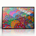 Large abstract wall art of Cancun scenery in muted blue and green, framed in black acrylic.