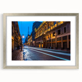 Textured abstract art print of Mexico City in muted earth tones on a silver-framed canvas, suitable for bedroom decor.