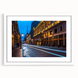 Abstract art print of Mexico City in muted gray and blue tones, framed with a white mat, suitable for dining room decor.