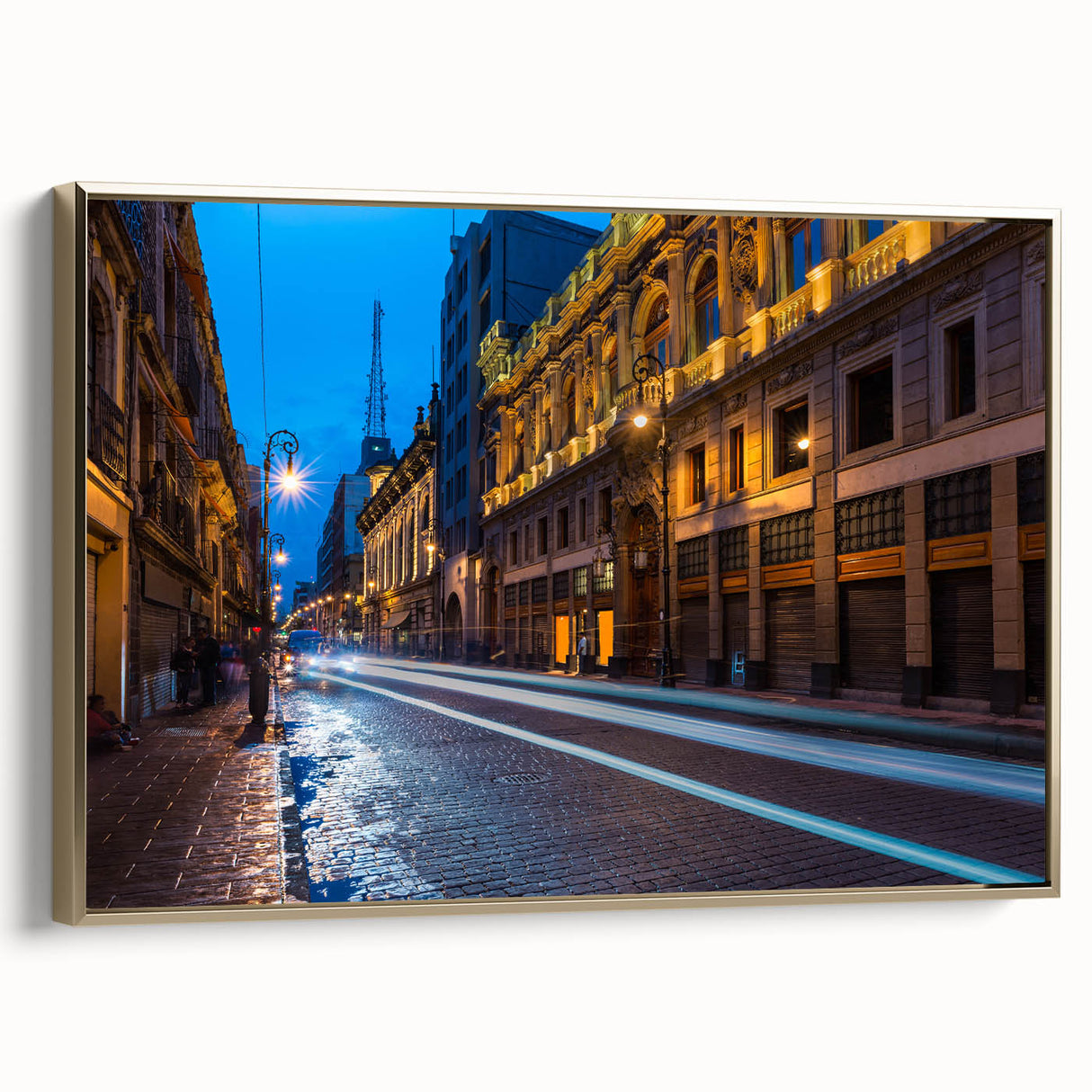 Framed canvas featuring a vintage-style landscape painting of Mexico City in black and gold tones.
