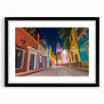Colorful abstract art print of Guanajuato scenery, featuring vibrant hues on a large framed canvas.