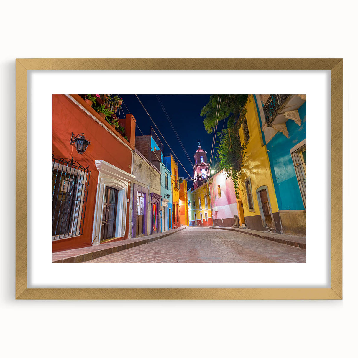 Extra large abstract art print of Guanajuato scenery in textured gold frame, featuring vibrant earth tones.