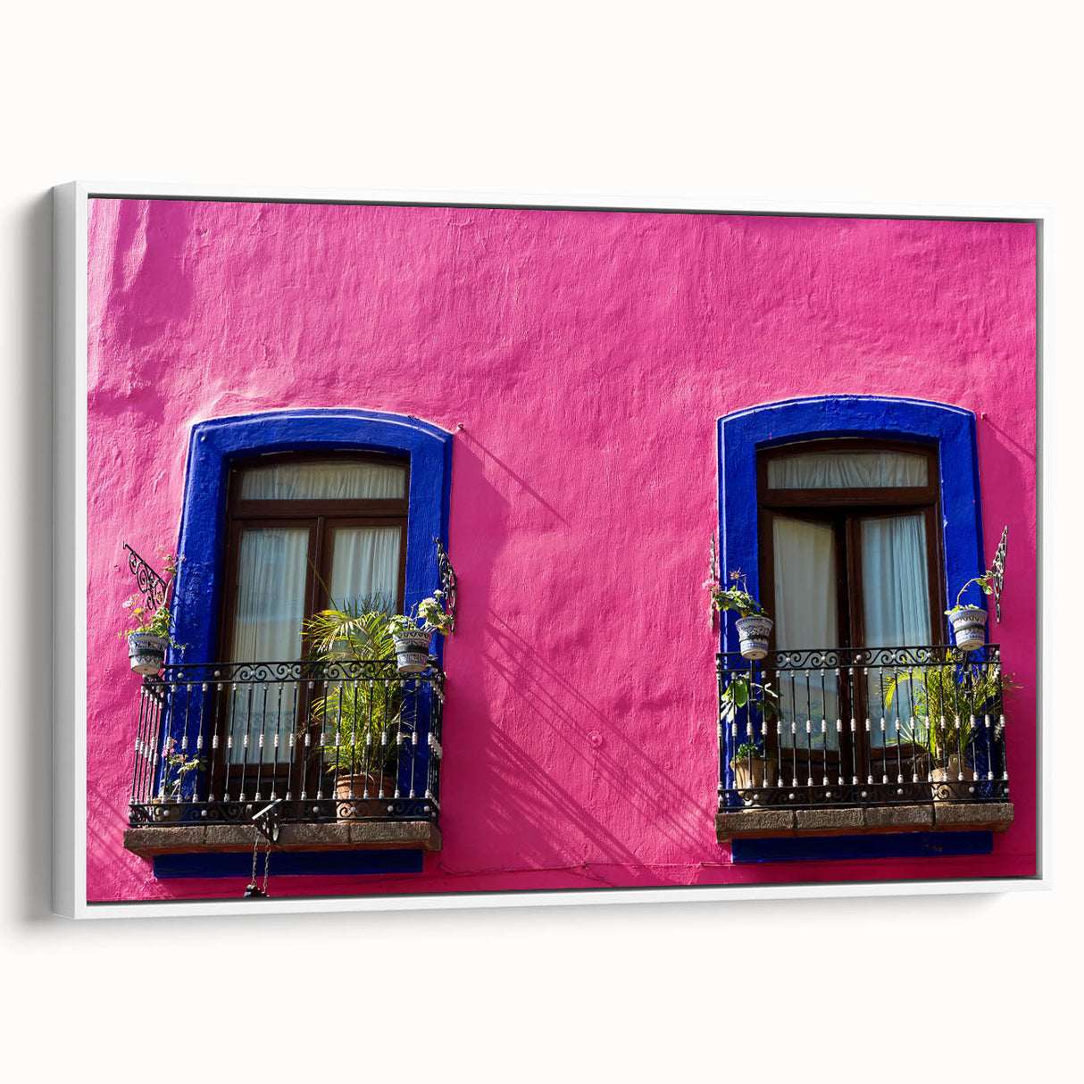 Vintage poster art of Oaxaca, Mexico, featuring colorful elements on a large framed canvas, ideal for living room decor.