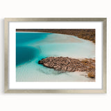 Abstract art print of Quintana Roo scenery in muted blue and green tones, framed in silver, ideal for dining room decor.
