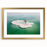 Extra large abstract art print of the Dead Sea in muted blue and beige tones, framed in gold, ideal for living room decor.