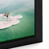 Extra large black framed canvas featuring a textured depiction of the Dead Sea in vibrant blue and white tones.