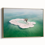 Framed canvas featuring a vintage-style landscape painting of the Dead Sea with a black and gold color palette.