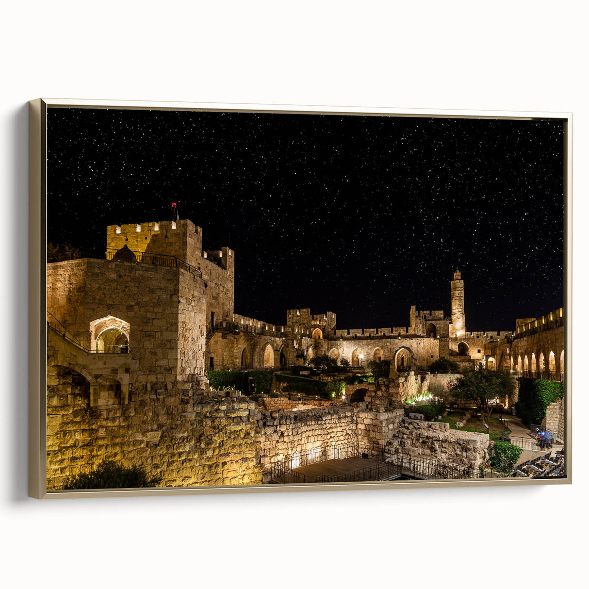 Framed canvas wall art featuring a vintage-style landscape painting of Jerusalem in muted gold and black tones.