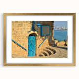 Extra large abstract art print of Tel Aviv skyline in textured golds and blues on a framed canvas.