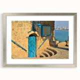 Textured abstract art print of Tel Aviv skyline in muted earth tones on a framed canvas, suitable for bedroom decor.